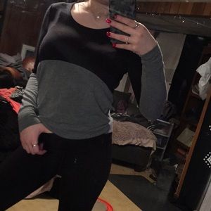 Black and gray color block sweater.